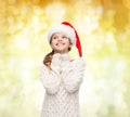 Dreaming girl in santa helper hat Royalty Free Stock Photo