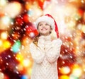 Dreaming girl in santa helper hat Royalty Free Stock Photo