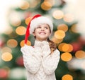 Dreaming girl in santa helper hat Royalty Free Stock Photo