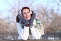 Dreaming girl in a winter park outdoors Royalty Free Stock Photo