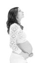 Dreaming happy pregnant woman looking up Royalty Free Stock Photo