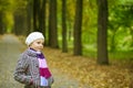 Dreaming nice little girl in park Royalty Free Stock Photo