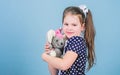 Dreaming of pet. small girl with soft bear toy. child psychology little girl playing game in playroom. happy childhood Royalty Free Stock Photo