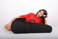 Dreaming teenage girl lying behind violin case Royalty Free Stock Photo