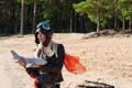 Dreaming woman in aviator helmet