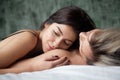 Dreaming woman enjoying romantic moment lying on man shoulder