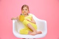 Dreaming young girl with lemonade on pink Royalty Free Stock Photo