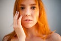 Dreammy gorgeous portrait of redhead woman in soft focus Royalty Free Stock Photo