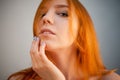 Dreammy gorgeous portrait of redhead woman in soft focus Royalty Free Stock Photo