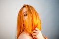 Dreammy portrait of bright redhead woman in soft focus Royalty Free Stock Photo