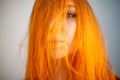 Dreammy portrait of shy redhead woman in soft focus Royalty Free Stock Photo