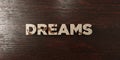 Dreams - grungy wooden headline on Maple - 3D rendered royalty free stock image