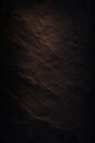 Dark Moody Slate Stone Texture Diagonal Cracks Warm Bronze Light Black Background Abstract Vertical Royalty Free Stock Photo