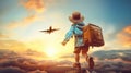 Dreams of travel! Child flying on a suitcase against the backdrop of a sunset