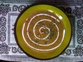 Dreamstime logo made by sourcream in a plate of soup