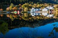 Autumn Landscape with Colourful Trees and Houses Reflection at Gamlehaugen Royalty Free Stock Photo