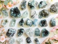 dreamy 3d rendering collection of colorful crystals on a sky blue background