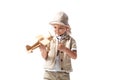 Explorer boy in glasses and hat holding wooden toy plane isolated on white