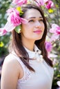 Dreamy girl with magnolia flower in her hair