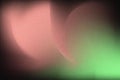 Vibrant duo-tone grain texture background with soft red and green gradients and artistic light effects Royalty Free Stock Photo