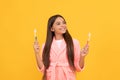 dreamy happy teen girl in home terry bathrobe hold toothbrush, health Royalty Free Stock Photo