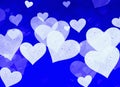 Dreamy light hearts on blue background