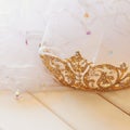 Dreamy photo of gold diamond tiara on toilette table Royalty Free Stock Photo