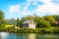 Dreamy photo of an old stone storehouse on the river bank. Glorious summer day in Kerikeri, New Zealand Royalty Free Stock Photo