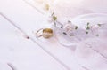 Dreamy photo of Wedding rings and white floral tiara Royalty Free Stock Photo