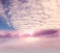 Pink  lilac orange sunset and blue cloudy  sun beam sky with rainbow nature landscape Royalty Free Stock Photo