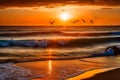 dreamy sunset at wavy beach Royalty Free Stock Photo