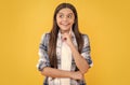 dreamy teen girl isolated on yellow. teen girl in studio. teen girl on background.