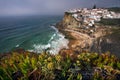 Dreamy view of the picturesque village Azenhas do Mar in sunset light with chalk houses on the edge of a cliff and beach Royalty Free Stock Photo