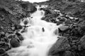 Dreamy waterfall between rocks