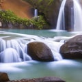 405 Dreamy Waterfall: A serene and dreamy background featuring a waterfall in soft and soothing colors that create a tranquil an