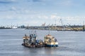 Dredger and hopper barge in fairway Riga