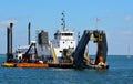 Dredger ship working at sea