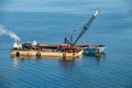 A Dredging Barge in the Nafplio Harbor Royalty Free Stock Photo