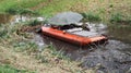 Dredging boat in a small canal