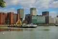 Dredging in front of Hogeschool builidngs on Posthumalaan, Rotterdam, Netherlands