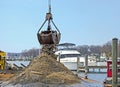 dredging out a marina boat slip Royalty Free Stock Photo