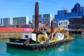 Dredging ship in the port of Auckland, New Zealand