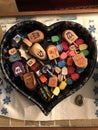 Dreidels in a Heart Shaped Container for Hanukkah Ce