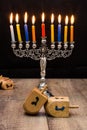 Dreidels and a menorah. Hanukkah Royalty Free Stock Photo
