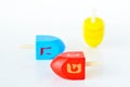 Dreidels (sevivons) during the Jewish holiday of Hanukkah Royalty Free Stock Photo