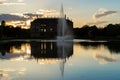 The silhouette of the Palais and the pond in the park \