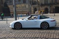 Dresden, Germany - July, 2015: Old man rides his porsche.