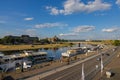 Dresden, Germany - June 28, 2022: Cityscape over the river Elbe to the Carola Bridge Carolabruecke. View from the Elbe terrace