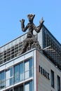 Dresden, Germany - June 3, 2023: Standart T(x), a sculpture by A.R.Penck on the roof of Penck Hotel Dresden.