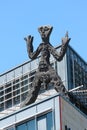 Dresden, Germany - June 3, 2023: Standart T(x), a sculpture by A.R.Penck on the roof of Penck Hotel Dresden.